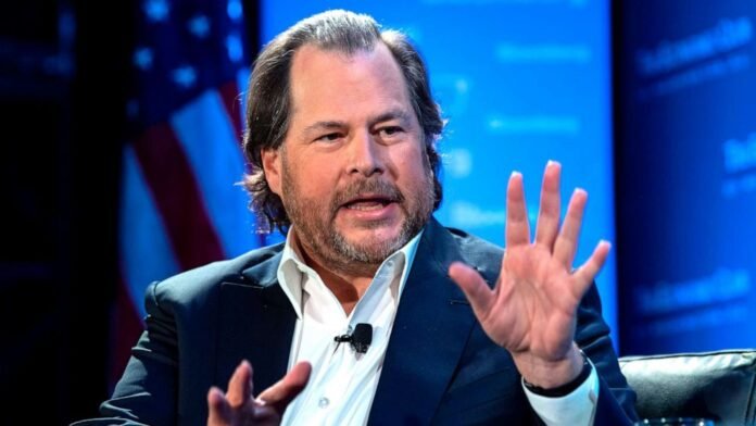 Benioff-gty-er-2025101325 A speaker gestures passionately while seated on stage