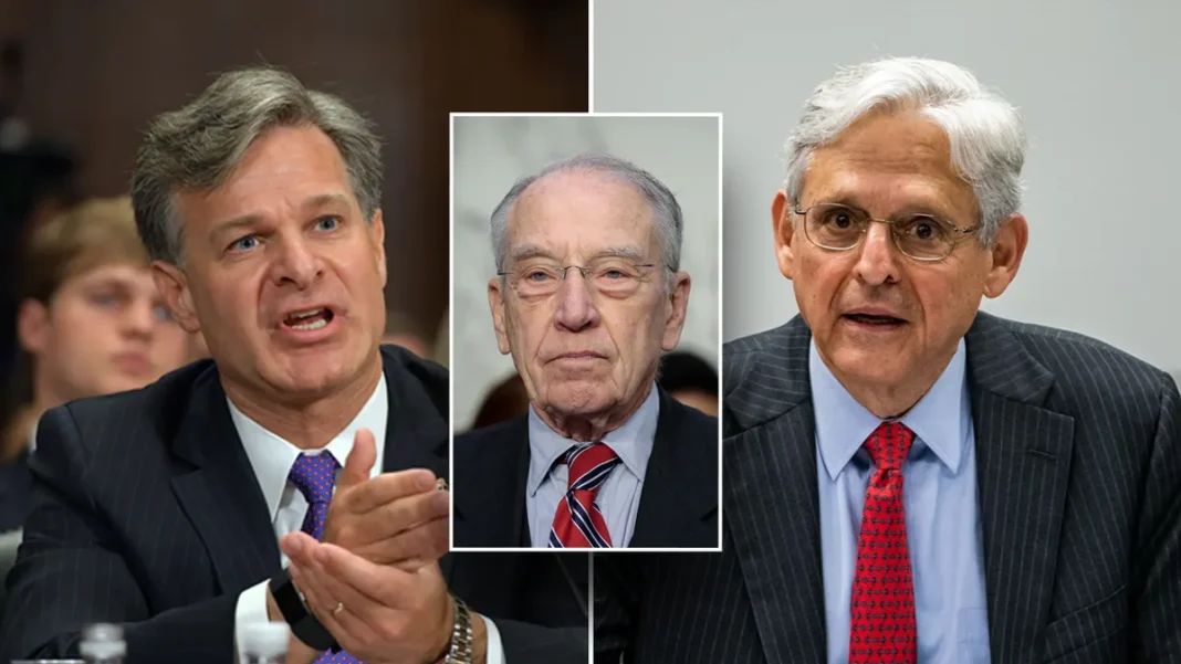 Grassley Exposes DOJ Memo Approving FBI ‘Arctic Frost’ Investigation into Trump Campaign Two men in suits, one applauding, seated next to a central image of a suited man, at a formal meeting or hearing setting.