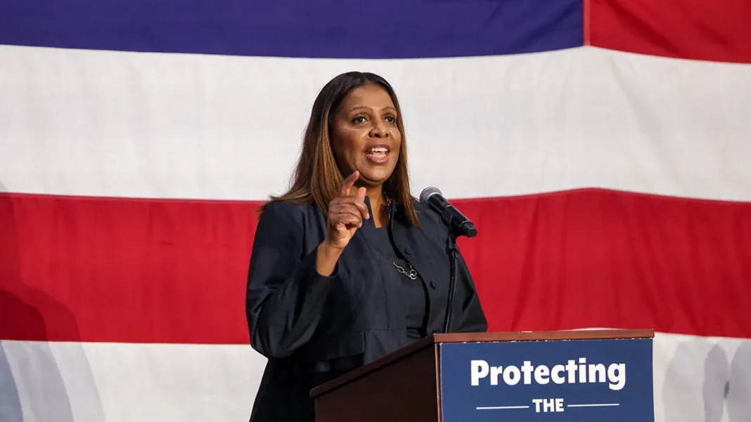 New York’s Letitia James Indicted for Mortgage Fraud Amid Accusations of Political Retaliation A woman speaking passionately at a podium with a banner reading "Protecting the" against a red, white, and blue background.