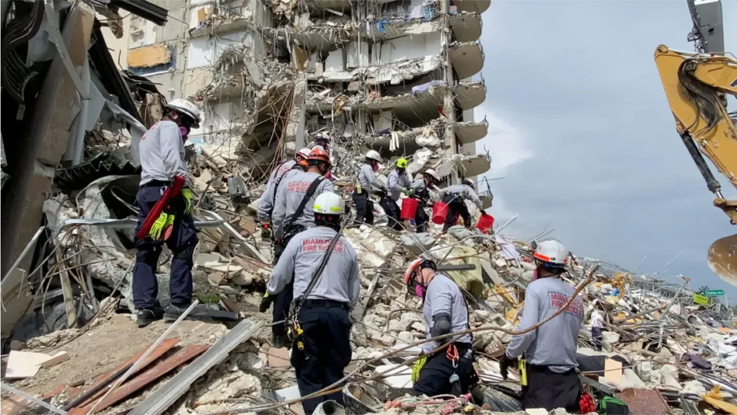 Rescue crews work through the rubble after the Champlain Towers South collapse in Surfside, Florida.