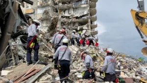 Rescue crews work through the rubble after the Champlain Towers South collapse in Surfside, Florida.