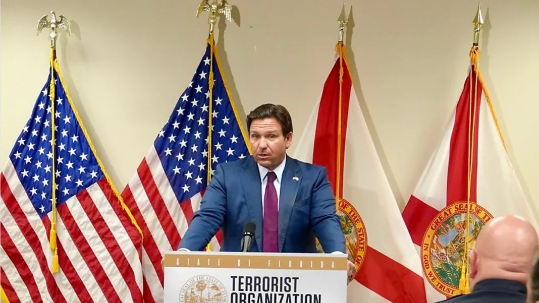 Florida Gov. Ron DeSantis announces recommendations to designate several organizations under Florida's new anti-terrorism law during a news conference in Tampa.