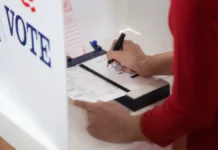 Florida Voters Have Until Aug. 6 to Request Vote-by-Mail Ballot for Primary Election A Florida voter marks a ballot inside a voting booth during the 2026 election.