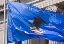CFO Blaise Ingoglia Signs DOJ Anti-Fraud Data-Sharing Agreement Department of Justice flag displayed outside DOJ headquarters in Washington, D.C.