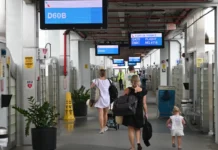 Miami-Dade Rejected Competitive Airport Janitorial Bid, Then Awarded Nearly $268 Million in Contracts Passengers walk through a concourse at Miami International Airport in Miami-Dade County.