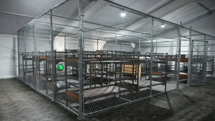 Fenced detention housing area inside Florida’s Alligator Alcatraz facility