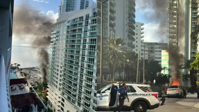 Smoke rises after a piling rig collapse on Brickell Bay Drive in Miami
